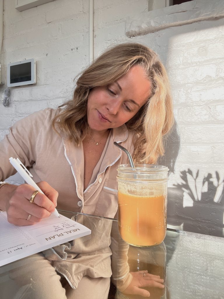 Nutritionist Edie Horstman plans meals while drinking iced coffee.