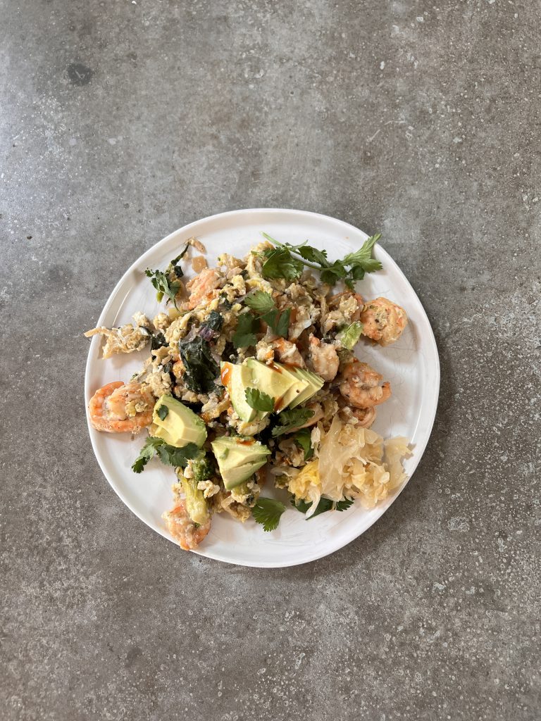Shrimp Stir-Fried with Cauliflower Rice and Avocado.