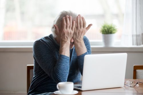 Tired senior mature man eyestrain can't see