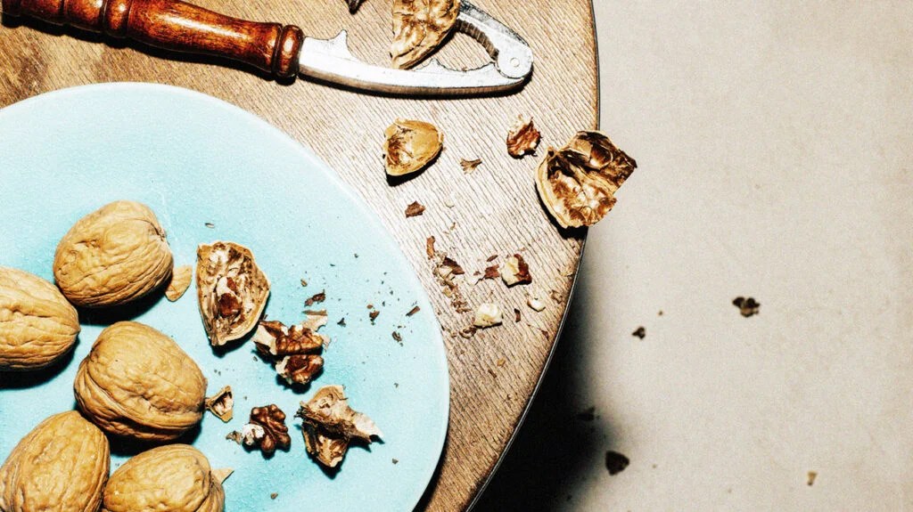 plate of nuts and a nutcracker