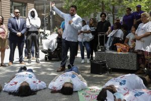 State Senator Omar Aquino speaks during a migrant healthcare protest June 21, 2023, at Federal Plaza. Members of Healthy Illinois and other campaign activists gathered to protest Governor JB Pritzker's recent decision to bar immigrants from enrolling in health coverage.