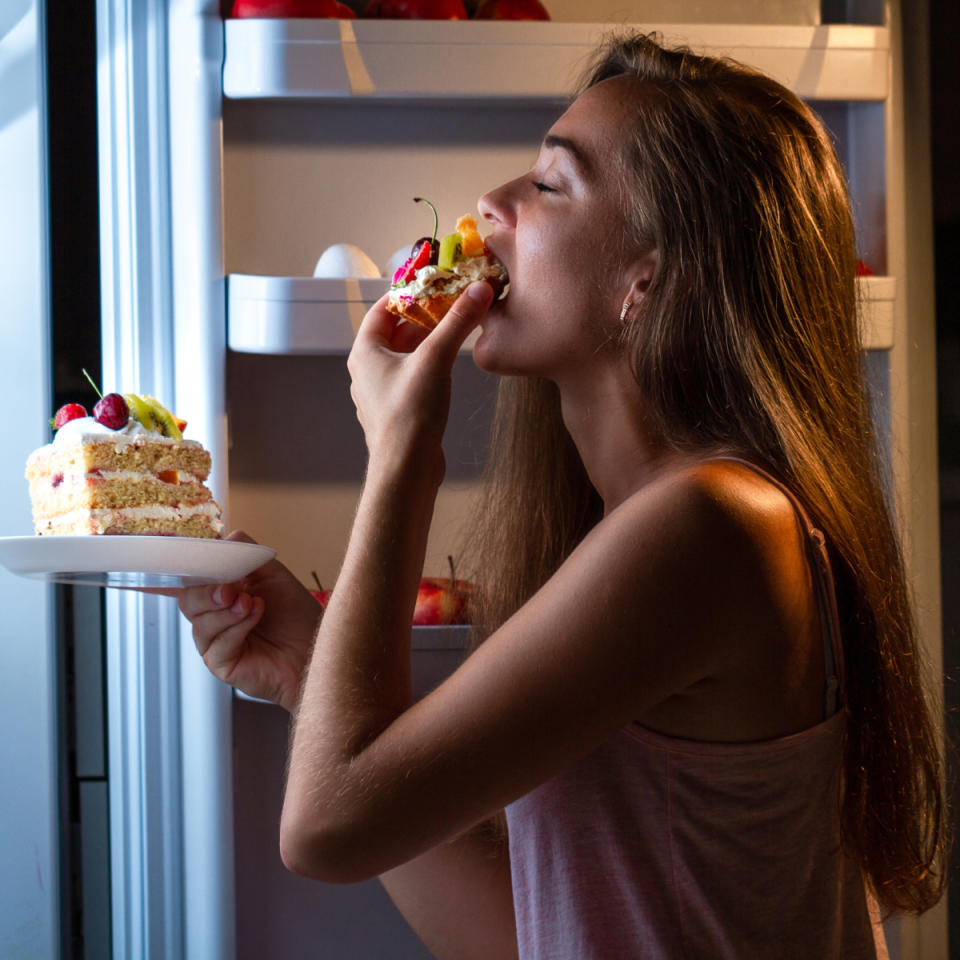 Woman late at night snacking