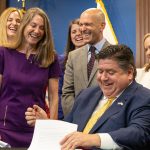 Oh, I signed!  says State Senator Laura Fine, D-Glenview, as she realizes that her bill giving the Department of Insurance new oversight authority was approved by Gov. JB Pritzker on June 27, 2023. (Andrew Adams/Capitol Illinois News)
